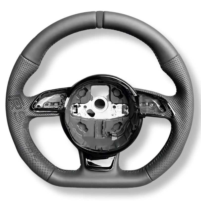 https://cdn.shopify.com/s/files/1/0727/0635/9572/files/Volant_audi_meplat_cuir_NOIR_12.jpg?v=1745700672
