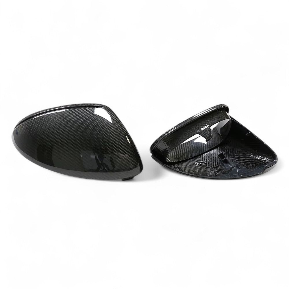 https://cdn.shopify.com/s/files/1/0565/4957/2747/files/porsche-cayenne-carbon-mirror-caps2_1.jpg?v=1762197628