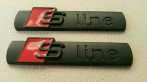 2x Emblèmes S-Line Noir Rouge Audi OEM Adhésif 3M - vue de face - Becquet Voiture