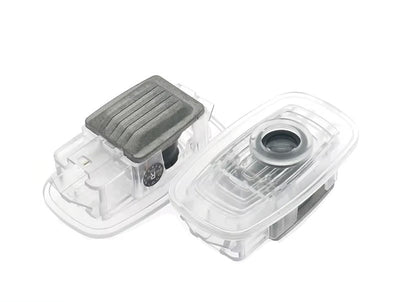 2x LEDs de Portes Logo AMG Mercedes CLA CLS E - vue de face - Becquet Voiture