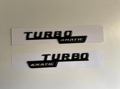 2x Logos Ailes Mercedes Turbo 4Matic - Finition Noir - vue de face - Becquet Voiture