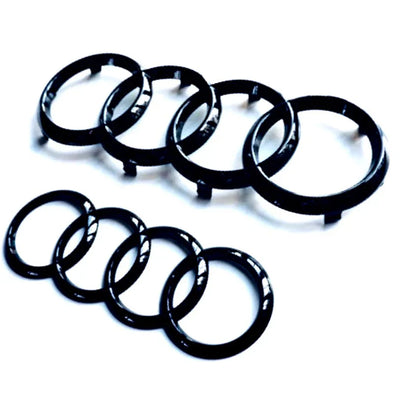2x Logos Audi Noir Brillant A1, A3, A4 A5 - vue de face - Becquet Voiture