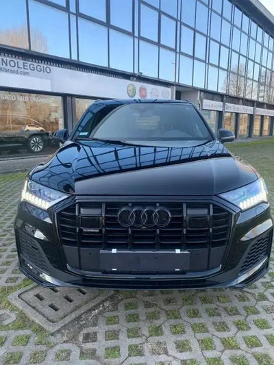 2x Logos Audi Noir Brillant Q7 2016-2023 - vue de profil - Becquet Voiture