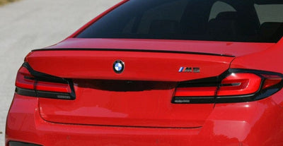 https://cdn.shopify.com/s/files/1/0565/4957/2747/files/Aileron-Becquet-type-M-Performance-Noir-Brillant-pour-BMW-Serie-5-G30-a-partir-de-2018-3.jpg?v=1761577624