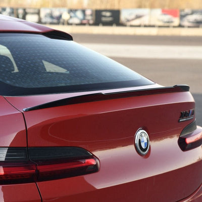 https://cdn.shopify.com/s/files/1/0565/4957/2747/files/Aileron-de-coffre-Becquet-type-M-Performance-Noir-Brillant-pour-BMW-X4-G02-A-partir-de-2018-3.jpg?v=1761577585