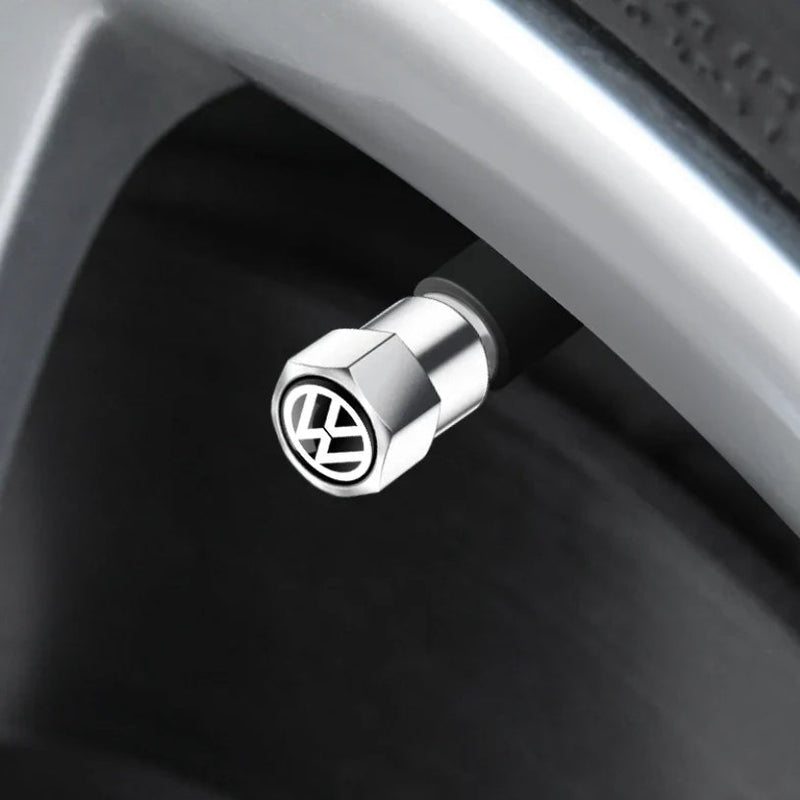 https://cdn.shopify.com/s/files/1/0727/0635/9572/files/bouchons_de_valve_VW_GTI_R.jpg?v=1735494373