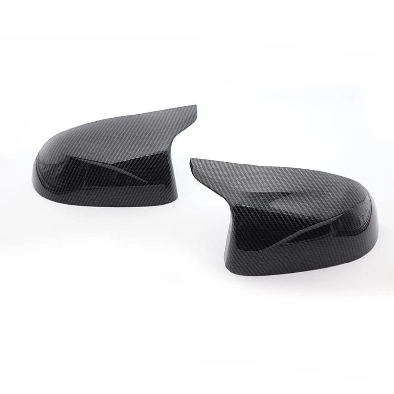 https://cdn.shopify.com/s/files/1/0565/4957/2747/products/Coques-de-retroviseurs-en-fibre-de-carbone-type-M-Performance-pour-BMW-X7-G07-2019-2025-8.jpg?v=1761604209