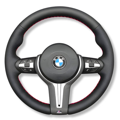 https://cdn.shopify.com/s/files/1/0727/0635/9572/files/CouvrevolantBMWF10F20F30Cuirrouge.jpg?v=1769554475