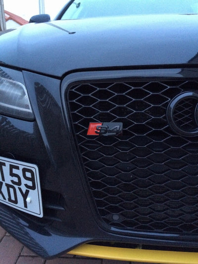 Emblème calandre Audi S4 noir brillant