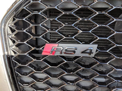 Emblème calandre Audi RS4 noir brillant