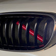 Garnitures V-Brace calandre BMW barres colorées