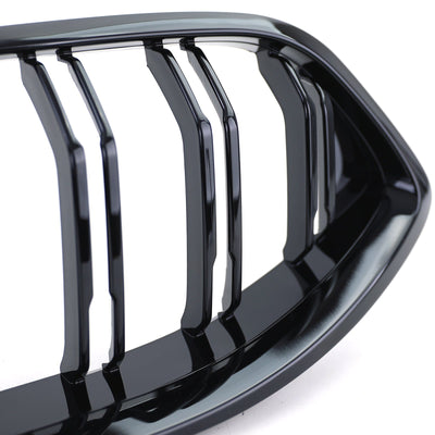 https://cdn.shopify.com/s/files/1/0565/4957/2747/files/Grilles-de-calandre-Noir-Brillant-type-M-Performance-pour-BMW-Serie-8-G15-2018-2025-5.jpg?v=1761587717