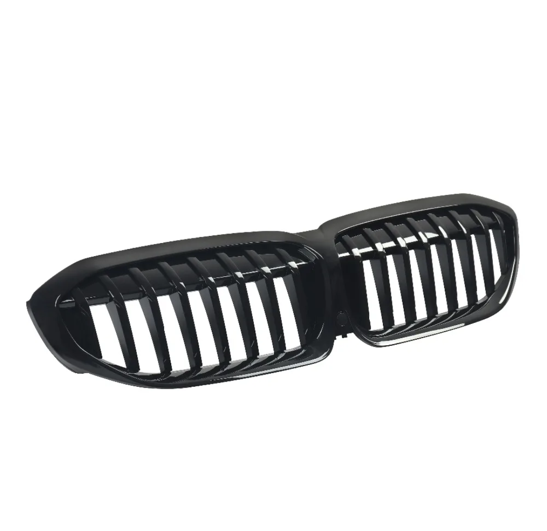 https://cdn.shopify.com/s/files/1/0565/4957/2747/files/Grilles-de-calandre-Noir-Brillant-type-M3-Competition-BMW-Serie-3-G20-2018-Aujourdhui.png?v=1761574127