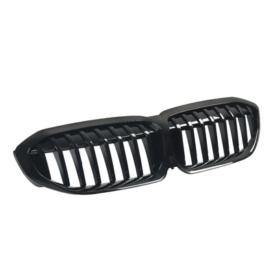 https://cdn.shopify.com/s/files/1/0565/4957/2747/files/Grilles-de-calandre-Noir-Brillant-type-M3-Competition-BMW-Serie-3-G20-2018-Aujourdhui.png?v=1761574127