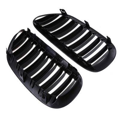 https://cdn.shopify.com/s/files/1/0565/4957/2747/files/Grilles-de-calandre-noires-brillantes-pour-BMW-Serie-6-E63-E64-2003-2010-5.png?v=1765146004