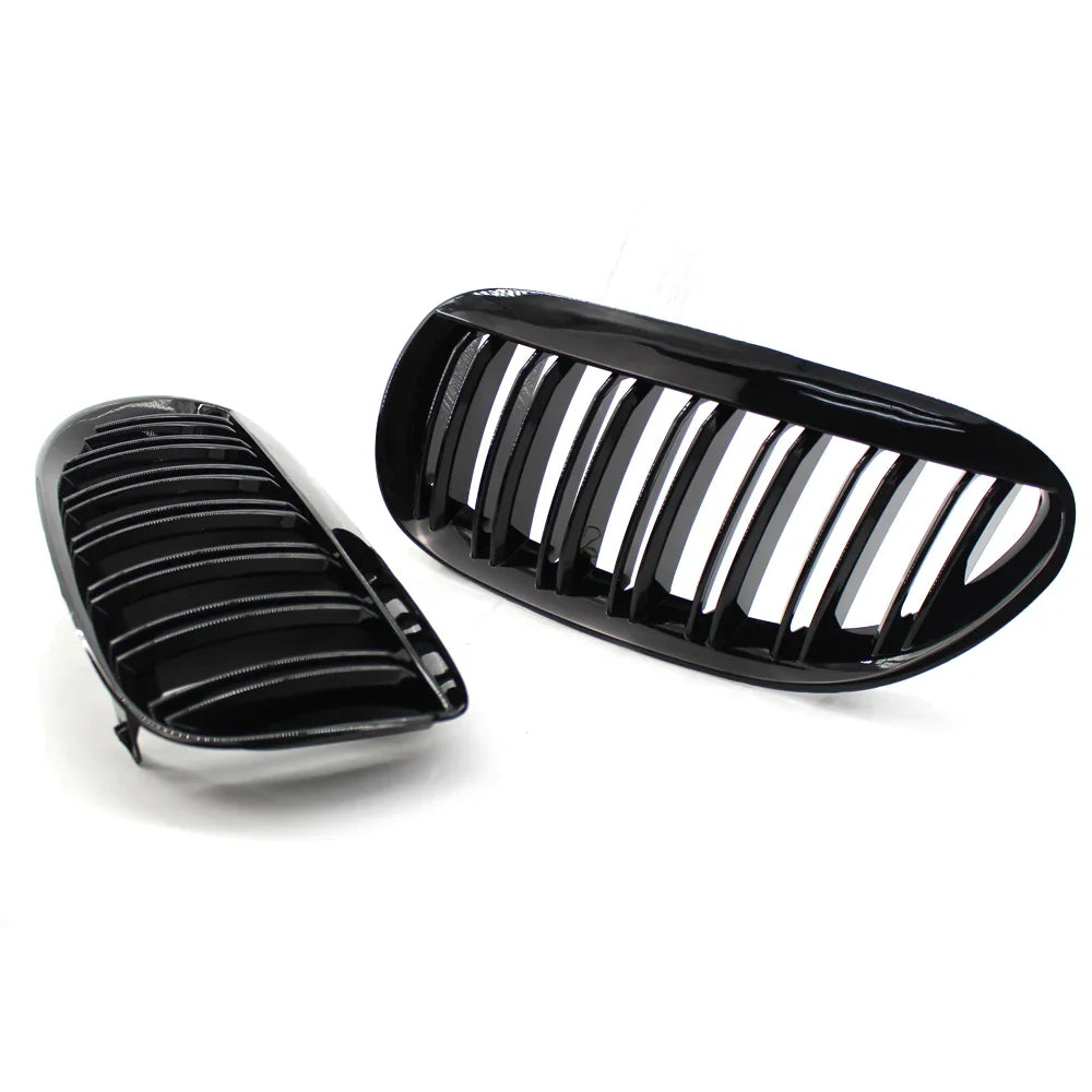 https://cdn.shopify.com/s/files/1/0565/4957/2747/files/Grilles-de-calandre-noires-brillantes-pour-BMW-Serie-6-E63-E64-2003-2010.webp?v=1761584876
