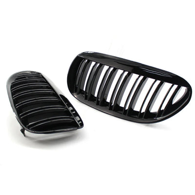 https://cdn.shopify.com/s/files/1/0565/4957/2747/files/Grilles-de-calandre-noires-brillantes-pour-BMW-Serie-6-E63-E64-2003-2010.webp?v=1761584876