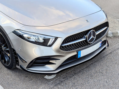 https://cdn.shopify.com/s/files/1/0565/4957/2747/files/Lame-avant-et-flaps-pack-A45s-AMG-Aero-pour-Mercedes-Classe-A-W177-2018-2025.jpg?v=1761577094