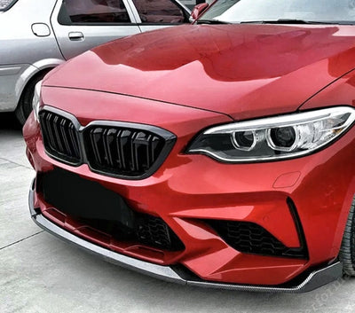 https://cdn.shopify.com/s/files/1/0565/4957/2747/files/Lame-avant-splitter-pare-choc-pour-BMW-M2-F87-2015-a-2021-2.jpg?v=1761593785