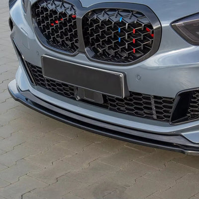 https://cdn.shopify.com/s/files/1/0565/4957/2747/files/Lame-avant-splitter-pare-choc-pour-BMW-Serie-1-F40-2019-a-2024-2.jpg?v=1761600007