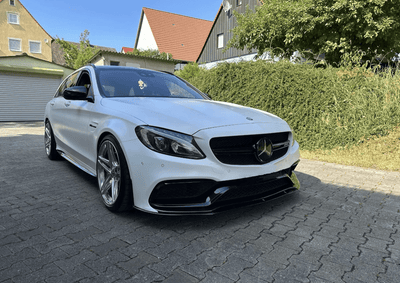 https://cdn.shopify.com/s/files/1/0565/4957/2747/files/Lame-avant-splitter-pare-choc-pour-Mercedes-Classe-C-63-AMG-W205-C205-2015-a-2022-3.png?v=1767089339