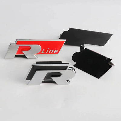https://cdn.shopify.com/s/files/1/0565/4957/2747/files/Logo-R-Line-de-calandre-pour-VW-Polo-Passat-Golf-Tiguan-T-Roc-Touareg-R-Noir-ou-Rouge-3.webp?v=1761585064