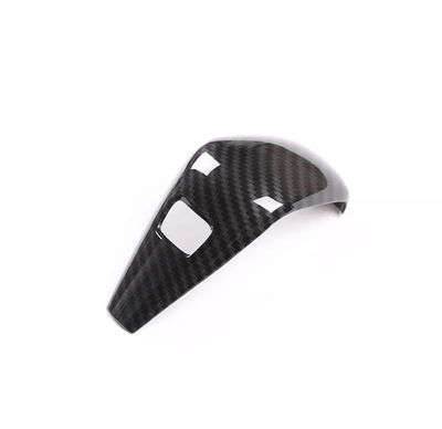https://cdn.shopify.com/s/files/1/0565/4957/2747/products/Pommeau-Selecteur-de-levier-de-vitesse-Carbone-pour-BMW-Serie-3-G20-2020-2025-2.png?v=1761576839