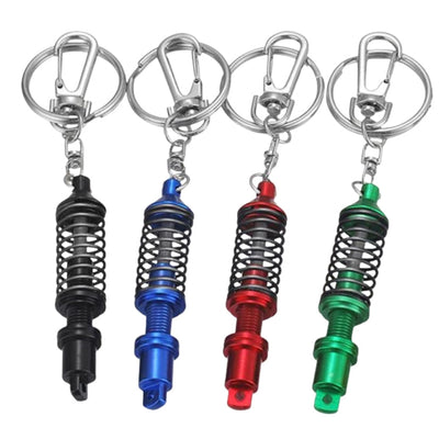 https://cdn.shopify.com/s/files/1/0727/0635/9572/files/PorteCleAmortisseurssuspension.jpg?v=1774439672