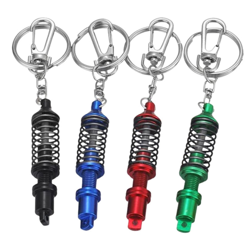 https://cdn.shopify.com/s/files/1/0727/0635/9572/files/PorteCleAmortisseursNoir.jpg?v=1774439600