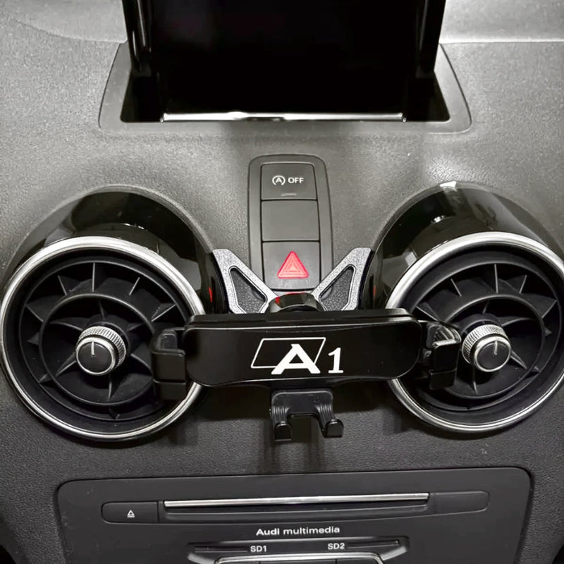 https://cdn.shopify.com/s/files/1/0727/0635/9572/files/SupporttelephoneAudiA1Noir.jpg?v=1731533687