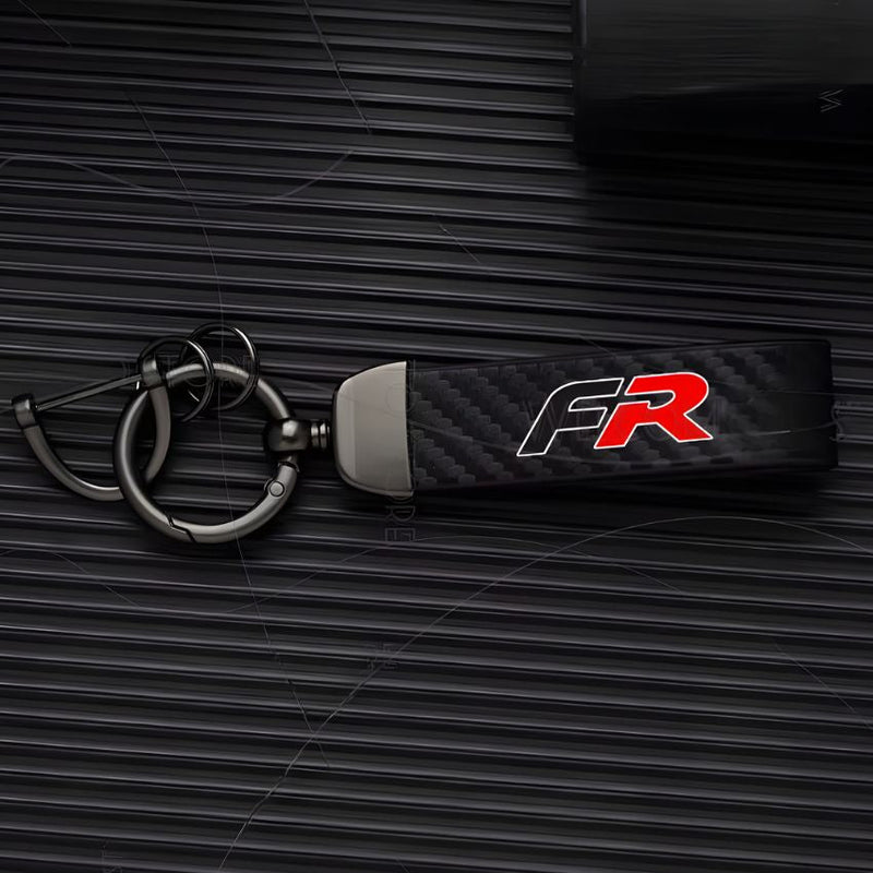 https://cdn.shopify.com/s/files/1/0727/0635/9572/files/Porte_cle_SEAT_FR_rouge.jpg?v=1766773618
