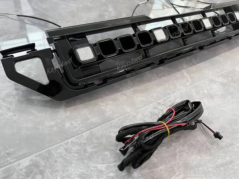 Calandre LED Dynamique Land Rover Defender L663 90 110 130 2020-2026 Type OCTA Jaune Blanc