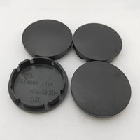 Cache-Moyeux Universels 56mm ABS Noir ou Argent — exemple de montage