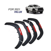 Élargisseurs d'Ailes Toyota Hilux Revo 4x4 2016-2021 Noir à Touches Rouges, Jeu de 4 Pièces
