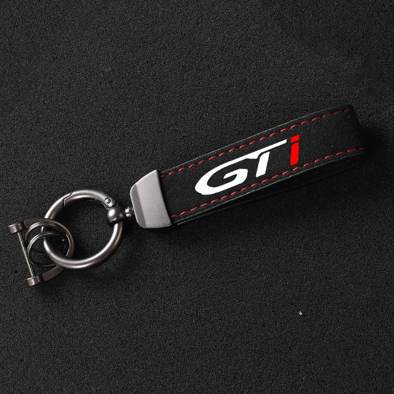 https://cdn.shopify.com/s/files/1/0727/0635/9572/files/porte_cle_peugeot_GTI.jpg?v=1740817990