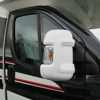 Coque de rétroviseur blanche montée sur un fourgon Fiat Ducato à bras long - Becquet Voiture