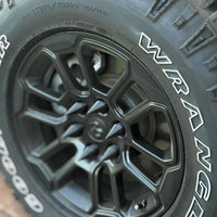Black 22 mm Conical Wheel Nut Covers — close-up