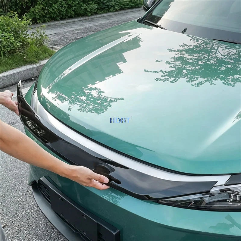 Calandre BYD Atto 3 Evo 2026 Bandeau Supérieur et Sourcils d'Optiques Style Racing, Kit 3 Pièces Aspect Carbone ou Noir