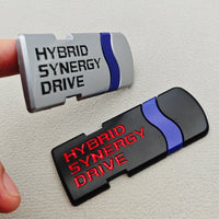 Emblème Hybrid Synergy Drive Métal 3D Toyota Corolla Yaris Auris RAV4 C-HR Noir Chrome Argent Or