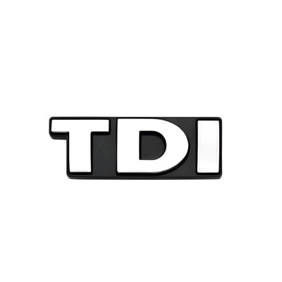 https://cdn.shopify.com/s/files/1/0727/0635/9572/files/TDI_LOGO_CHROME_AVANT_1.jpg?v=1772062609