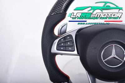 https://cdn.shopify.com/s/files/1/0893/0259/7955/files/Volant_Mercedes_CLA_AMG_fibre_de_carbone_img_4_-_www.lrrsmotor.fr_df15be35-f7fe-41e4-9ca4-9fa2f8cbc73b.webp?v=1729617350