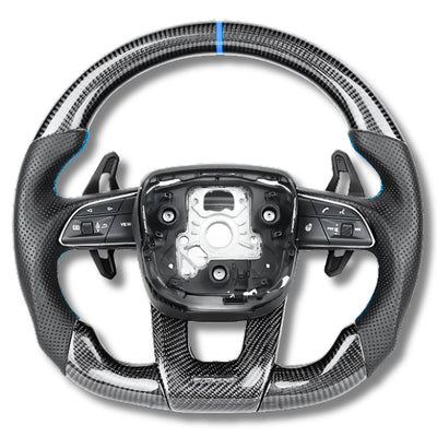https://cdn.shopify.com/s/files/1/0727/0635/9572/files/Volant_URUS_Carbone_CUIR_Bleu.jpg?v=1751720623