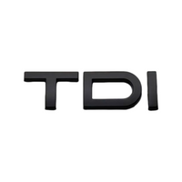 Badge coffre Audi TDI 2.0 noir - vue de dessus - Becquet Voiture