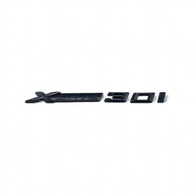 Badge Noir Coffre BMW X6 Xdrive 30d 35i 35d 40i - vue arrière - Becquet Voiture