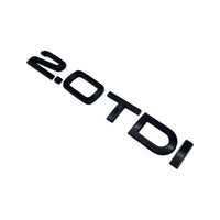 Badges coffre Audi TDI noir brillant - vue de trois-quarts - Becquet Voiture