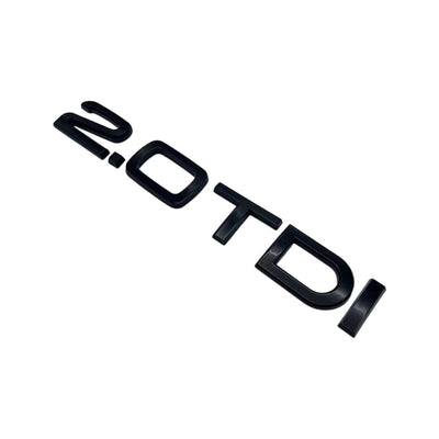Badges coffre Audi TDI noir brillant - vue de trois-quarts - Becquet Voiture