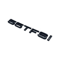 Badges coffre Audi TFSI noir - détail du montage - Becquet Voiture