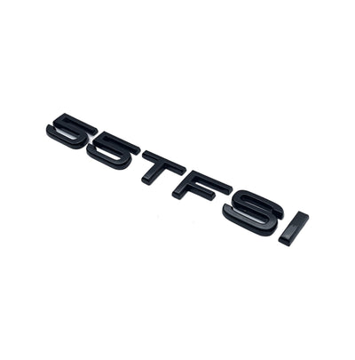 Badges coffre Audi TFSI noir - détail du montage - Becquet Voiture