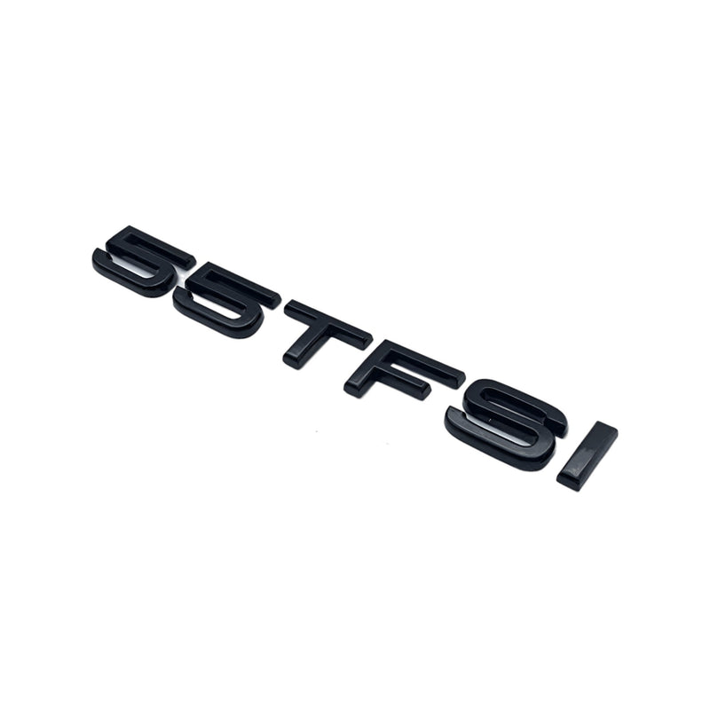 Badges coffre Audi TFSI noir - détail du montage - Becquet Voiture