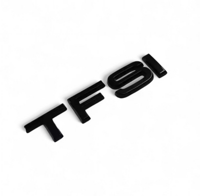 Badges coffre Audi TFSI noir - vue de dessus - Becquet Voiture
